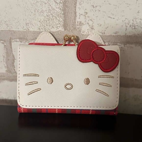 Sanrio Handbags - Hello Kitty Tri-fold wallet